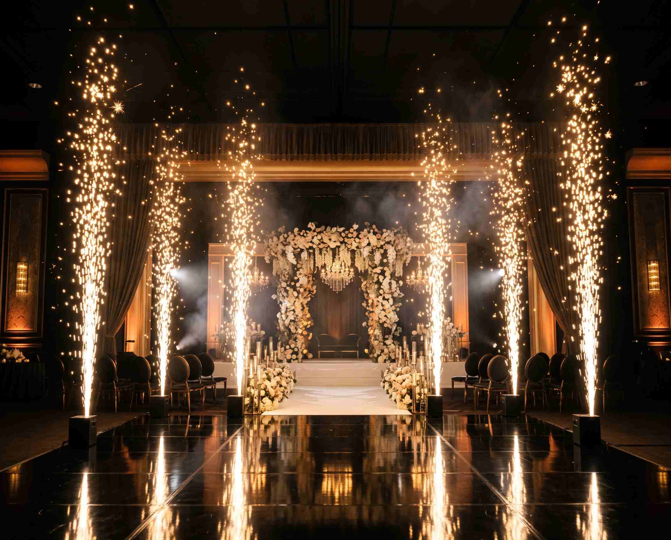 Cold pyro fountains lighting up a wedding stage